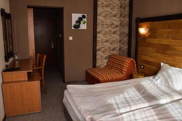 Фото номера Двухместный номер с 2 отдельными кроватями Отель Flora Hotel г. Боровец 11