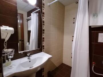 Фото номера Двухместный номер с 2 отдельными кроватями и террасой Отель ELA hotel г. Боровец 15